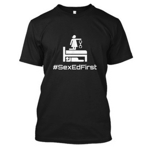 Sex Ed First tee black with white letters.