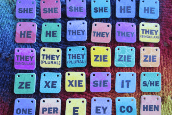 Gender Pronouns, image of gender pronouns name tags in rainbow colors