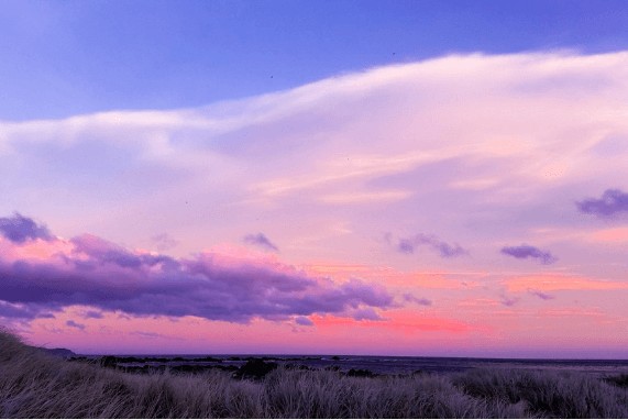 Domestic Violence Awareness Month, purple sky on a horizon